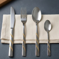 Luxury Stainless Steel Cutlery Set - 24 Pieces with a Gold Spiral Design and Modern Organizer.
