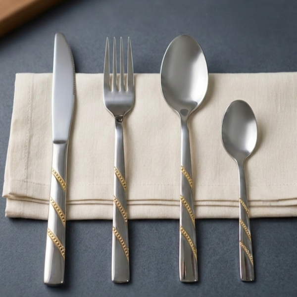 24-piece stainless steel cutlery set with gold spiral handle design and stand